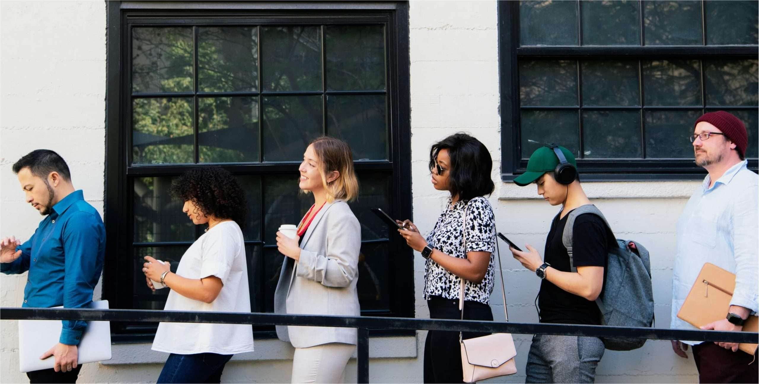 A group of people waiting in line.